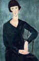 woman sitting in blue dress Amedeo Modigliani